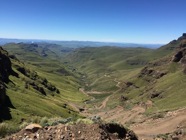 The 33 kilometre trip up the Sani Pass to the highest pub in Africa and onwards into the ‘mountain kingdom’ will become more accessible and act as a magnet to boost visitor numbers when the job of laying asphalt on the twisting gravel surface that links South Africa and Lesotho is completed.