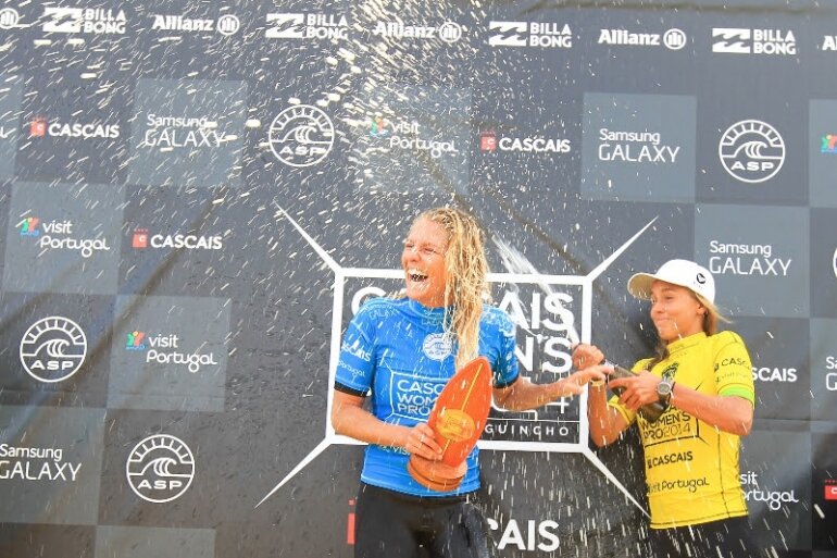 Caption: Stephanie Gilmore celebrates her win at the Cascais Women's Pro. Image: ASP / Masurel